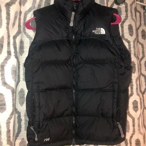 Woman’s north face puffy vest